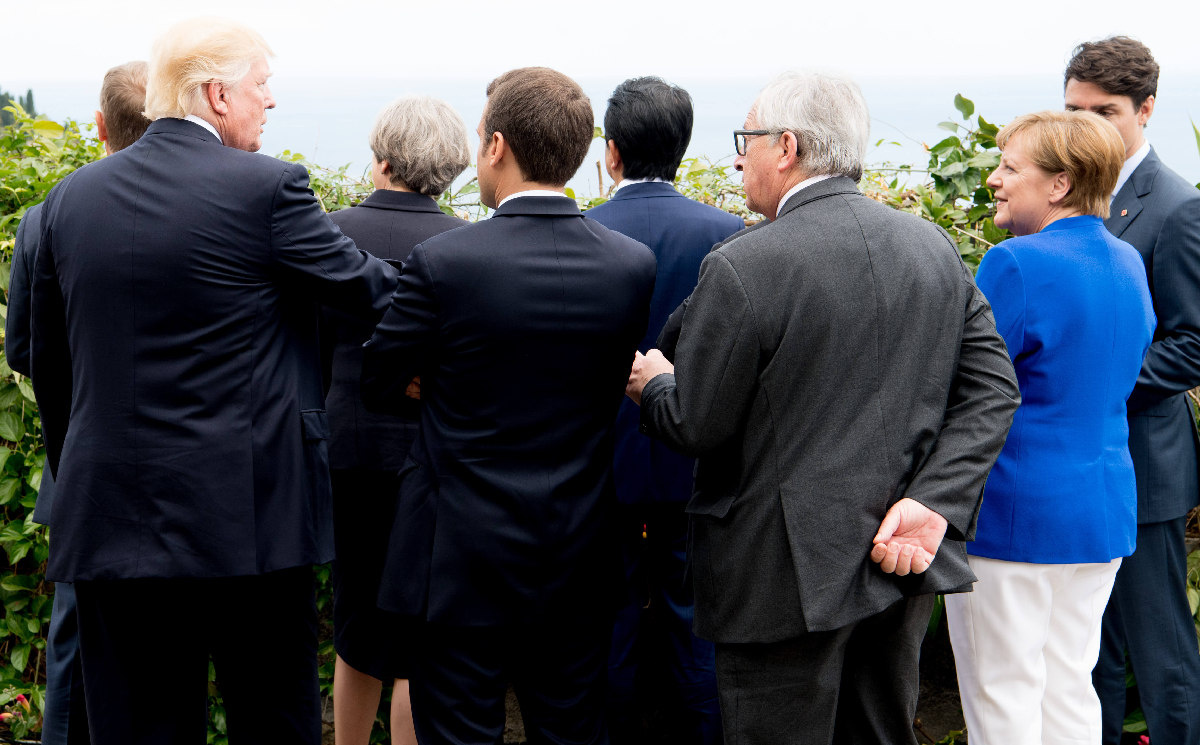 Donald Tusk, Donald Trump, Theresa May, Emmanuel Macron, Shinzo Abe, Jean-Claude Juncker, Angela Merkel and Justin Trudeau during the G7 summit in Italy 2017.