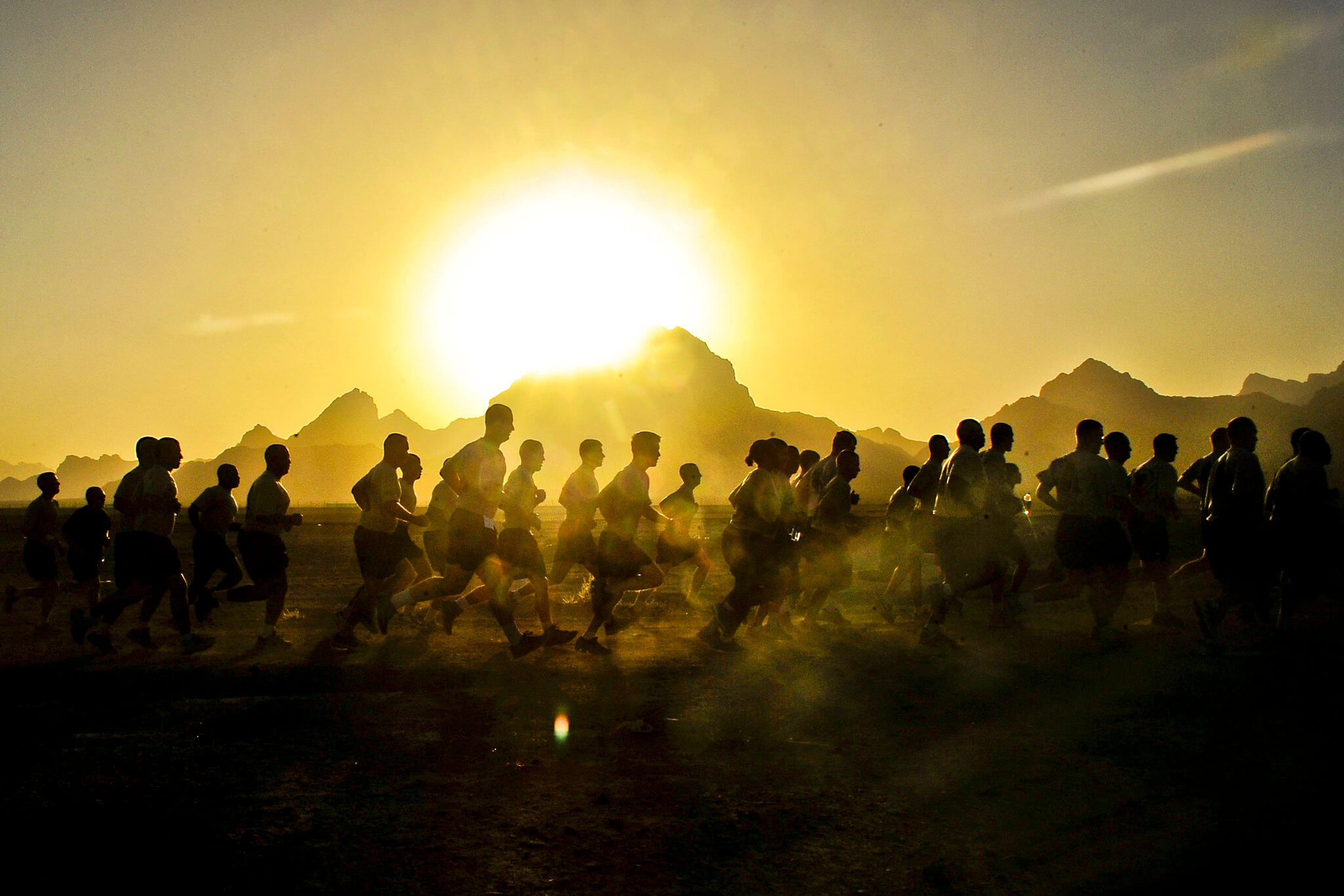 American military personnel on a training run in 2010. © Expert Infantry / Flickr