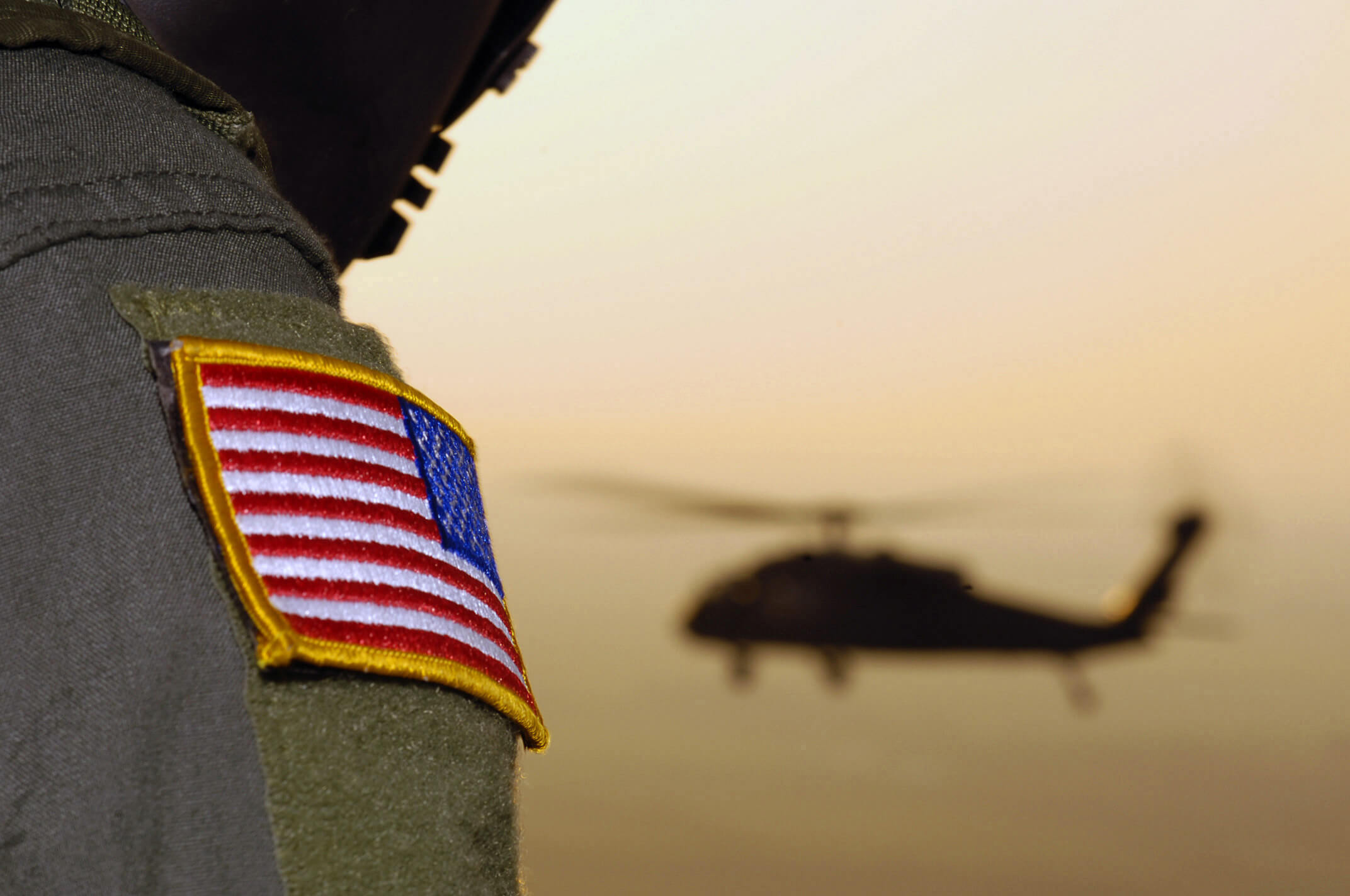 Close-up of a US Flag patch as a US Army Black Hawk helicopter returns to Ellington Field, Texas. © MCWNIMC, US Army - Flickr