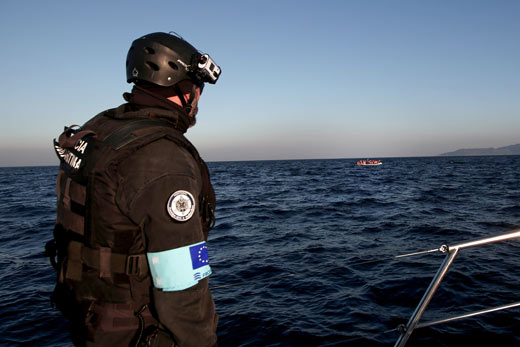 A representative of Frontex agency during a patrol near the Greek island of Lesbos in 2015.