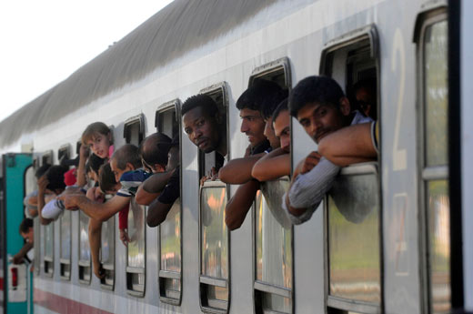 Migrants aboard a train at the Croation Beli Manastir station near the Hungarian border, 2015.