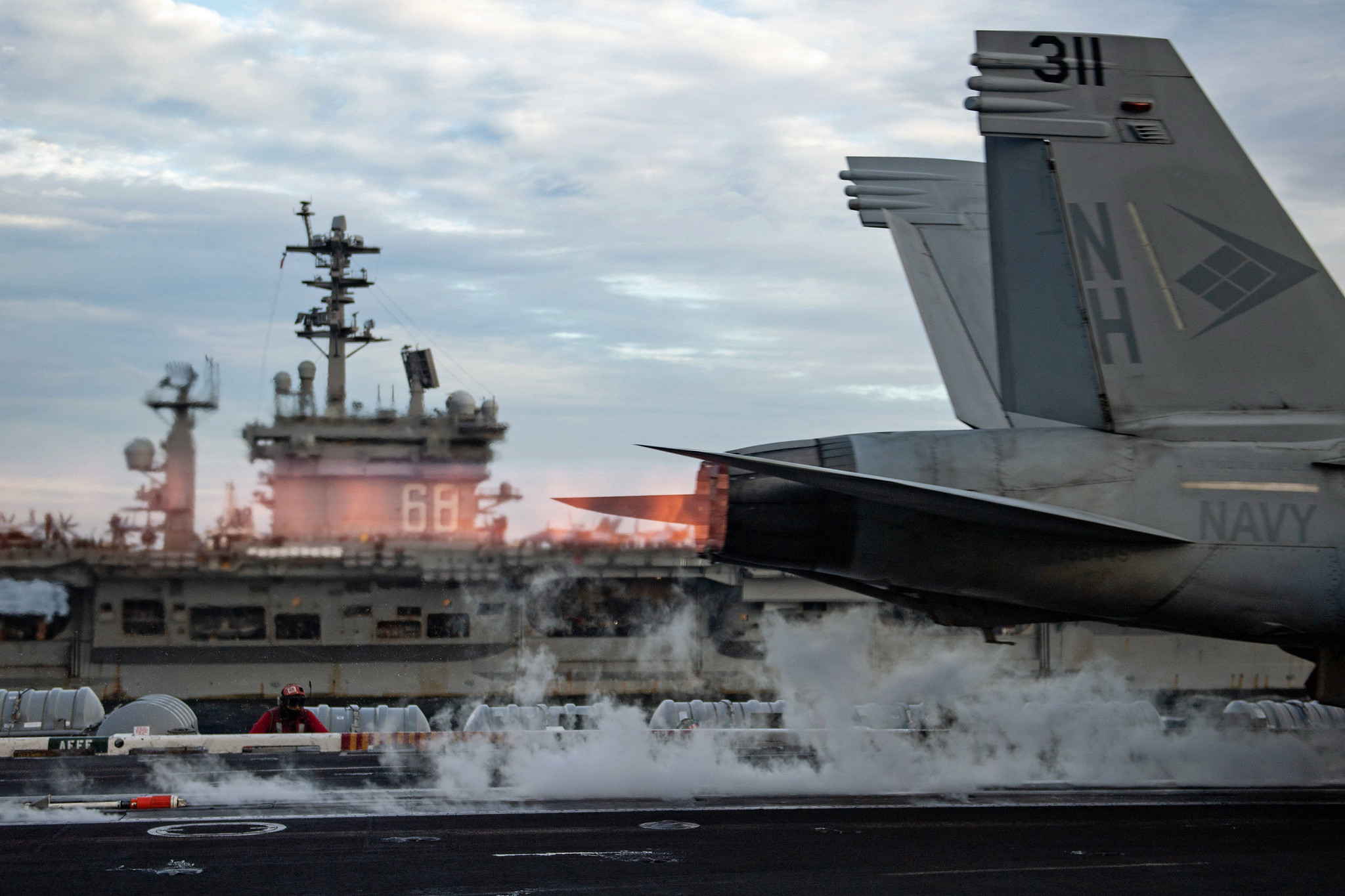 An F/A-18E Super Hornet launches from USS Theodore Roosevelt (CVN 71) while conducting dual-carrier operations with the Nimitz Carrier Strike Group in the South China Sea on 9 February 2021. © U.S. Indo-Pacific Command / Flickr 