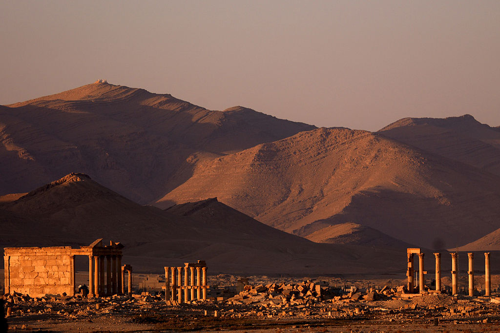 De verwoeste site van de Syrische stad Palmyra