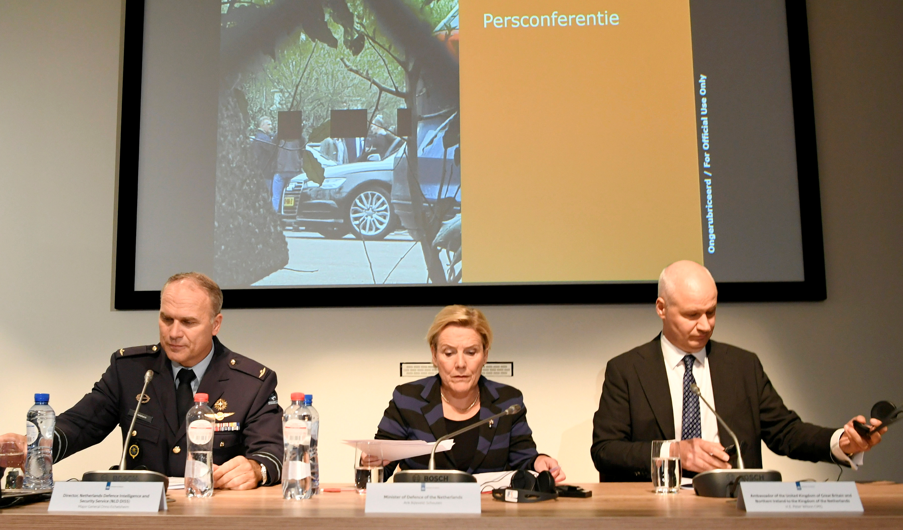 Dutch Minister of Defence Ank Bijleveld, general Onno Eichelsheim, director of Netherlands Defence Intelligence and Security Service and British Ambassador to the Netherlands Peter Wilson attend a news conference in The Hague on 4October 2018. Piroschka van de Wouw via Reuters.