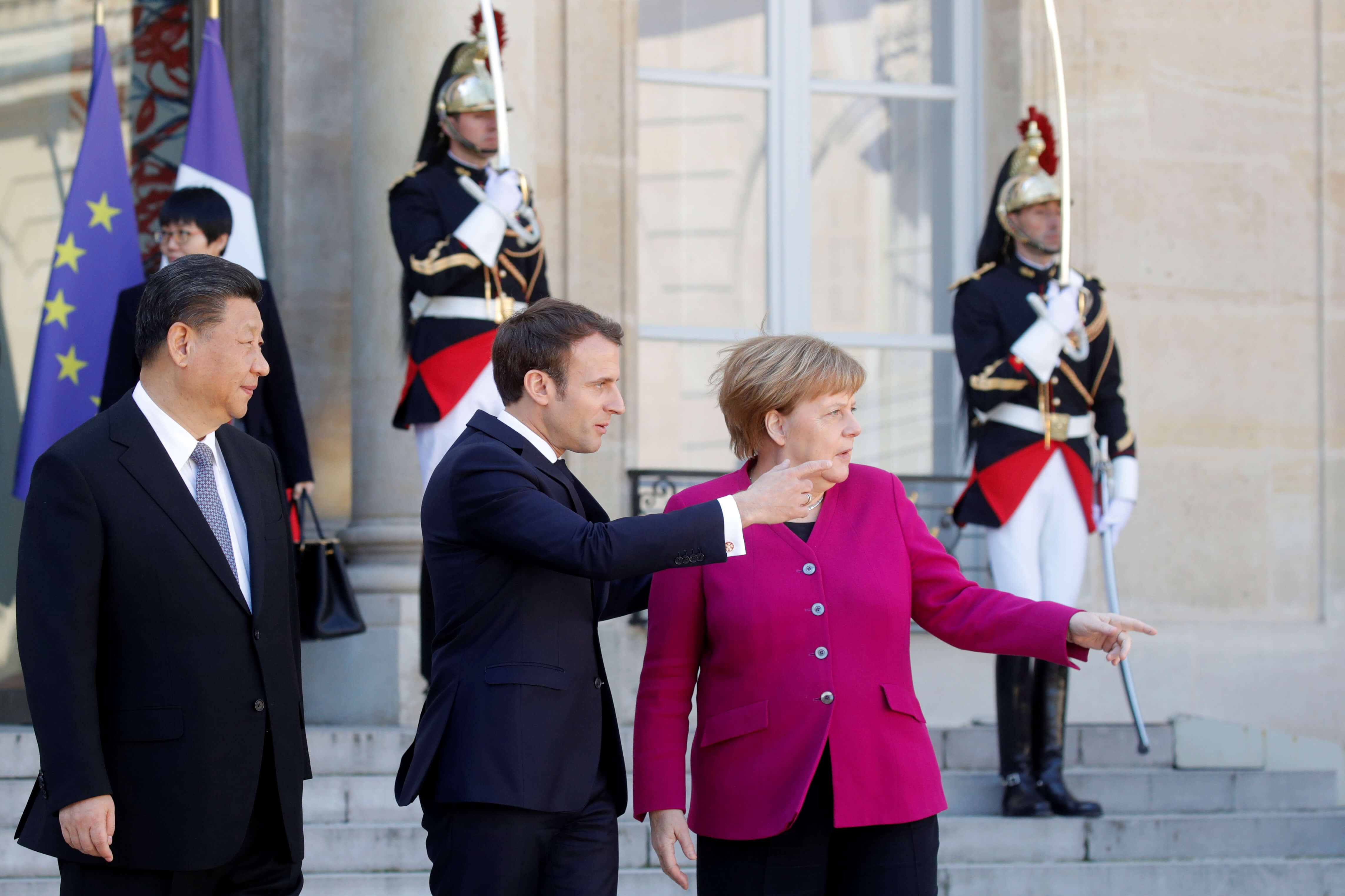 Dams - French President Emmanuel Macron, German Chancellor Angela Merkel and Chinese President Xi Jinping in Paris, France, March 26, 2019. REUTERS-Philippe Wojazer.jfif