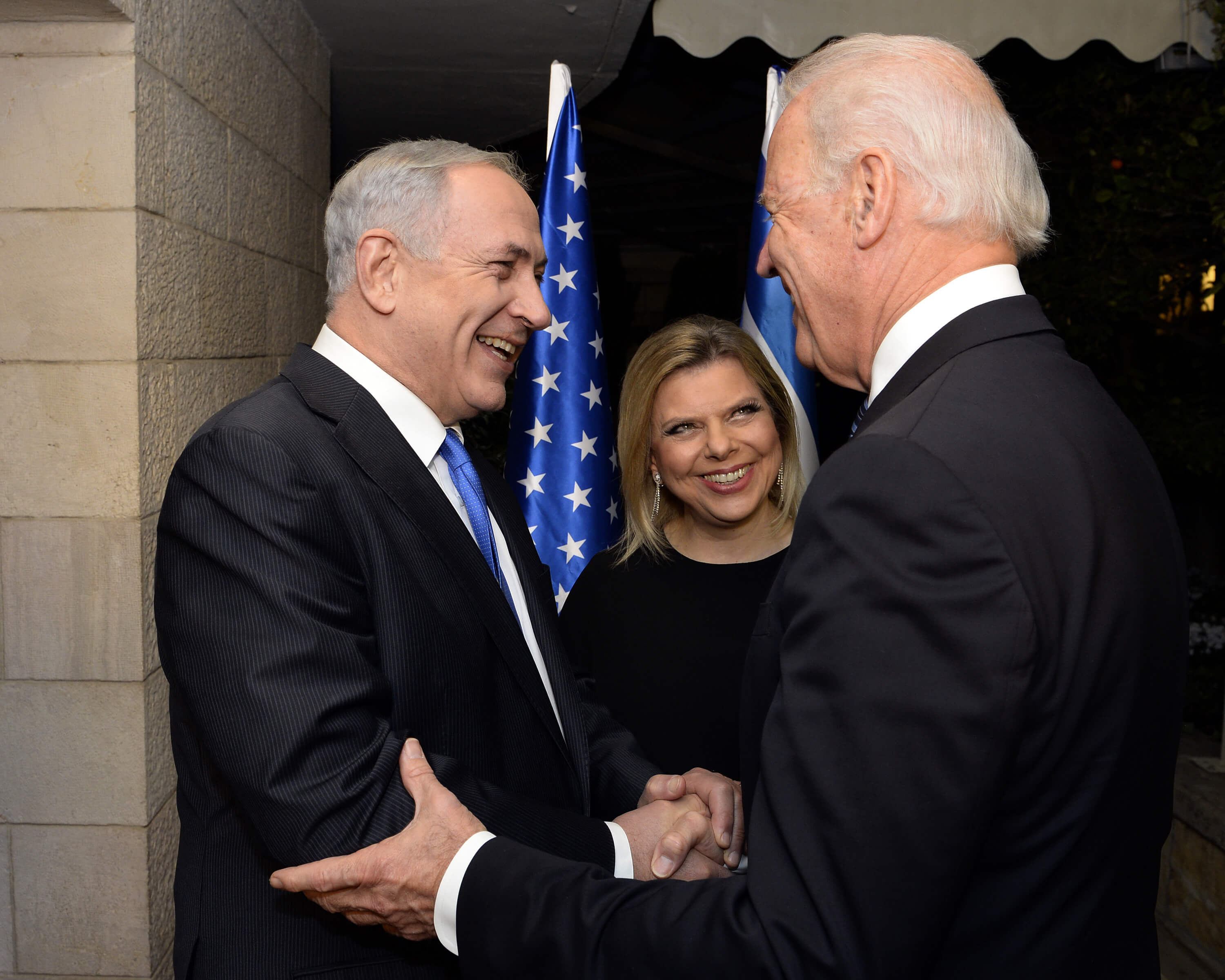 Gilboa - Joe Biden as vice-president in 2013 is greeted by Israeli Prime Minister Benjamin Netanyahu and his wife in Jerusalem. US Department of State