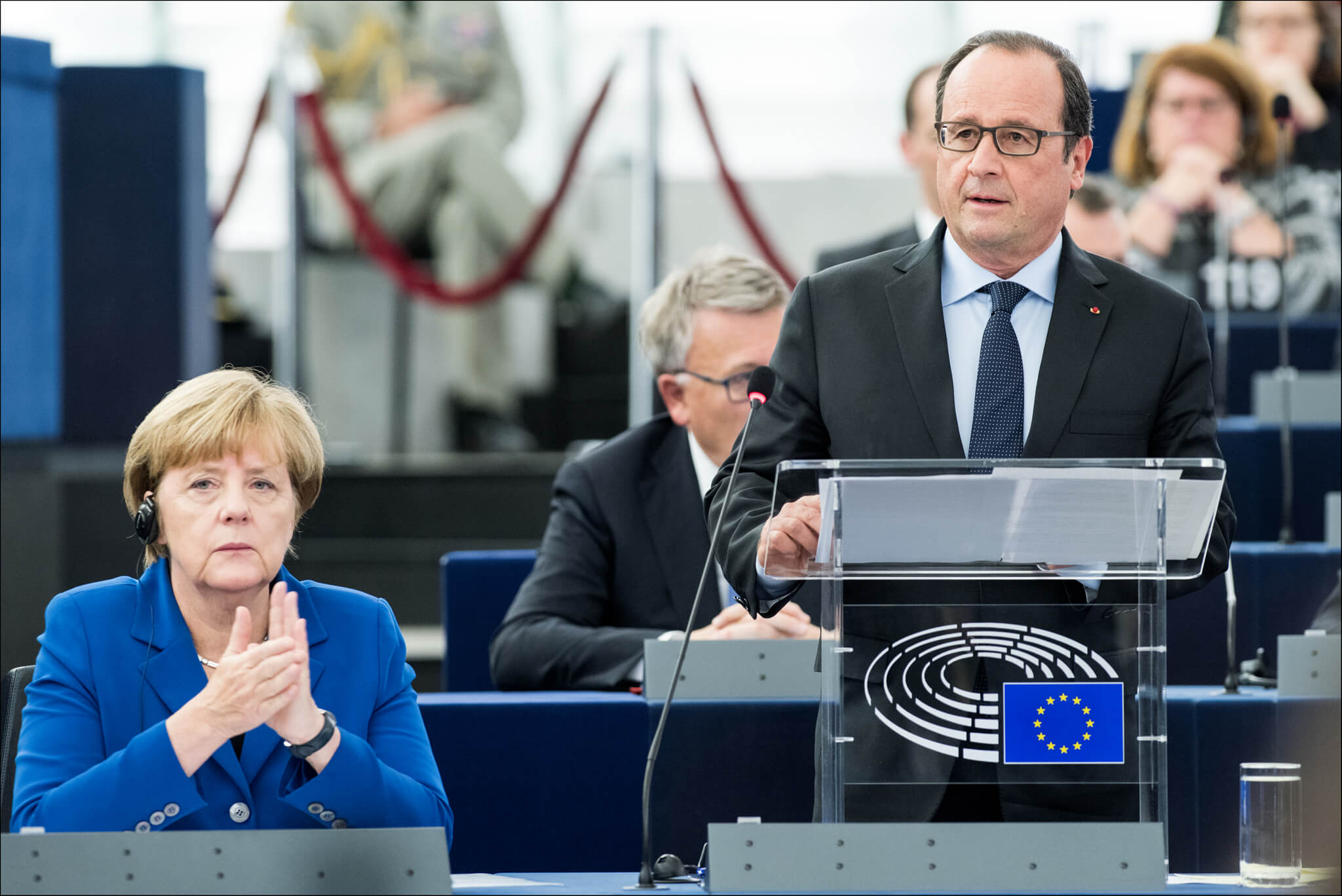 Hollande and Merkel in the plenary chamber for an historic debate with MEPs in 2015. European Parliament