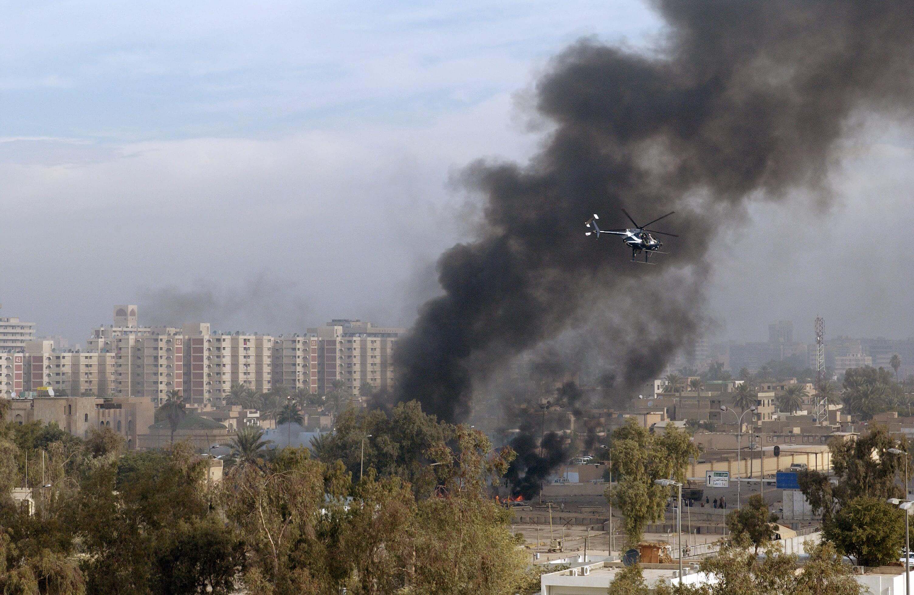 Joachim - A Blackwater Security Company MD-530F helicopter aids in securing the site of a car bomb explosion in Baghdad, in December 2004, during the Iraq War. Wikimediacommons