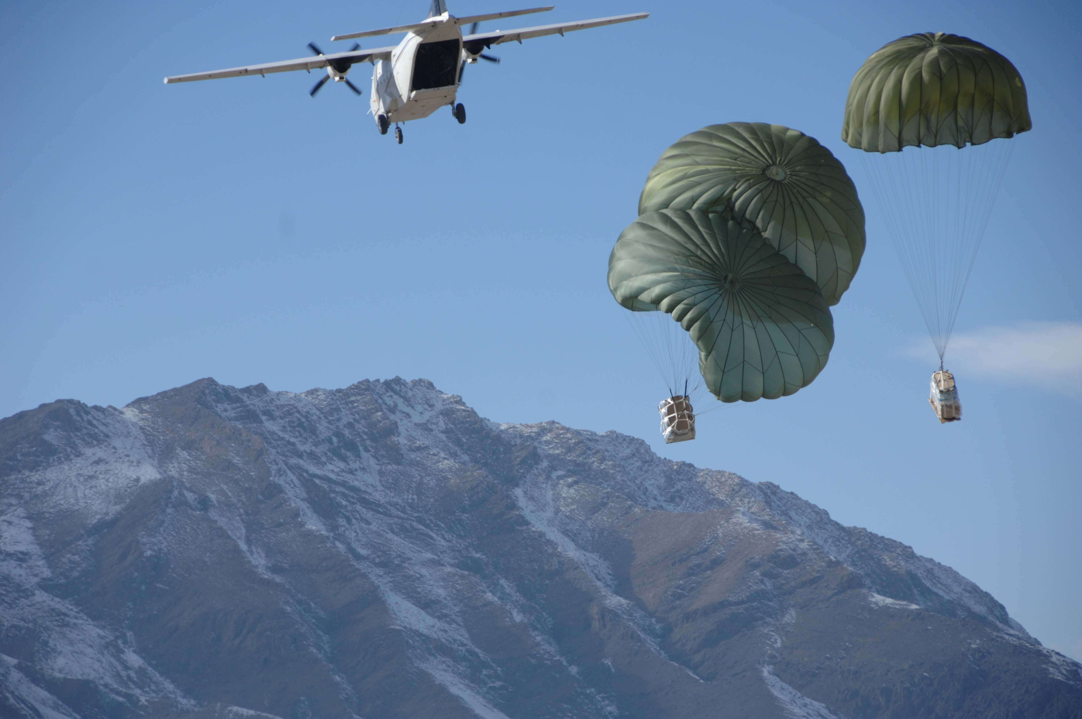 Joachim - Blackwater cargo aircraft over Afghanistan dropping supplies to U.S. Army soldiers in 2007. Wikimediacommons