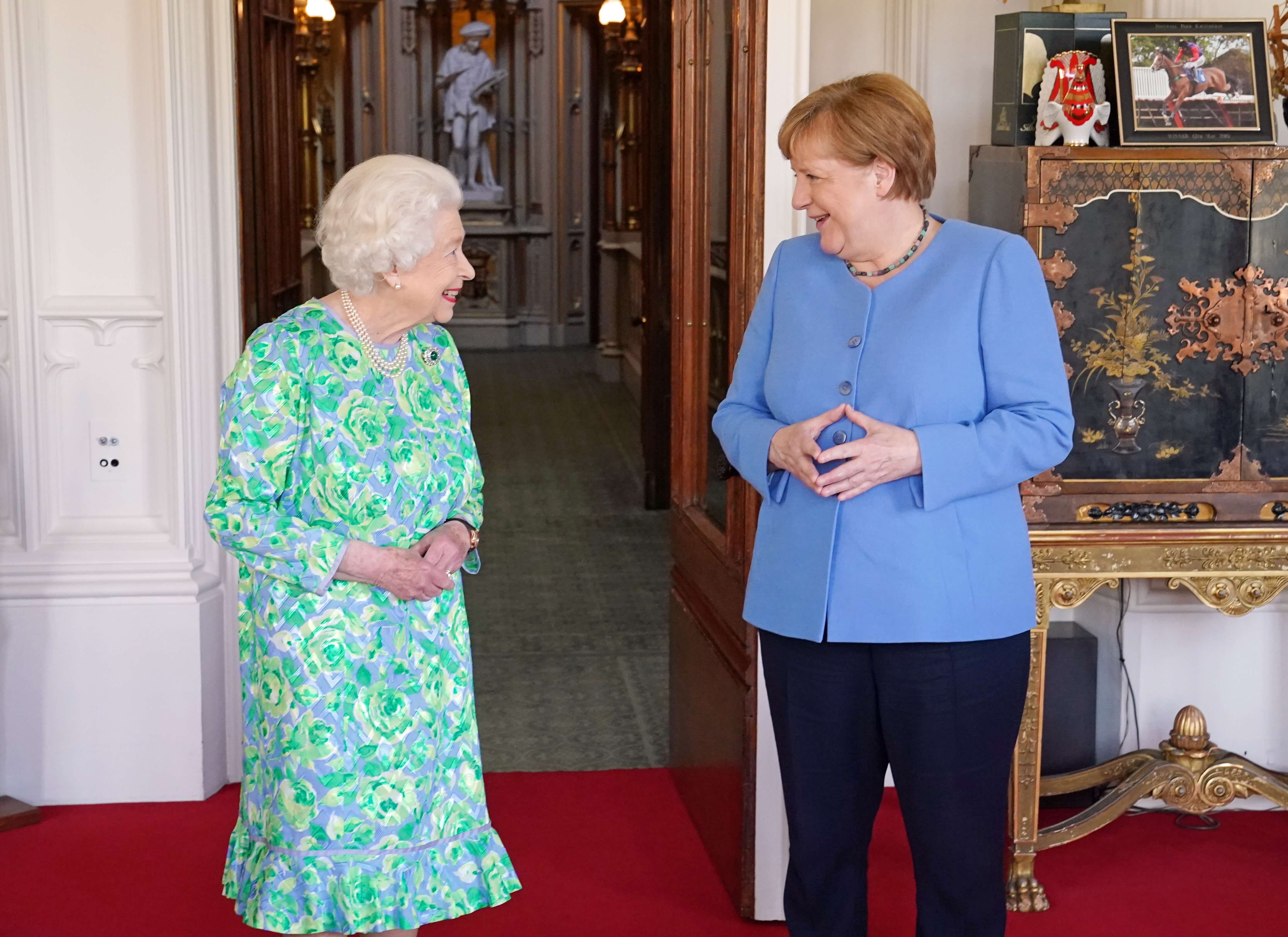 Britain's Queen Elizabeth receives German Chancellor Angela Merkel, during an audience at Windsor Castle in Berkshire, Britain July 2, 2021. Steve Parsons/Pool via REUTERS