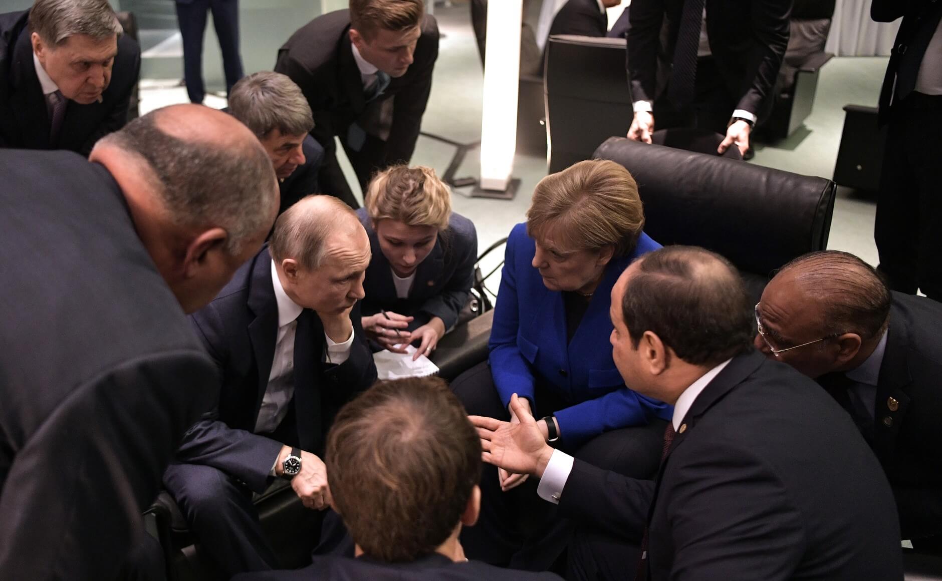 Russian President Vladimir Putin with Federal Chancellor of Germany Angela Merkel during an international conference on Libya in 2020. © Wikimediacommons