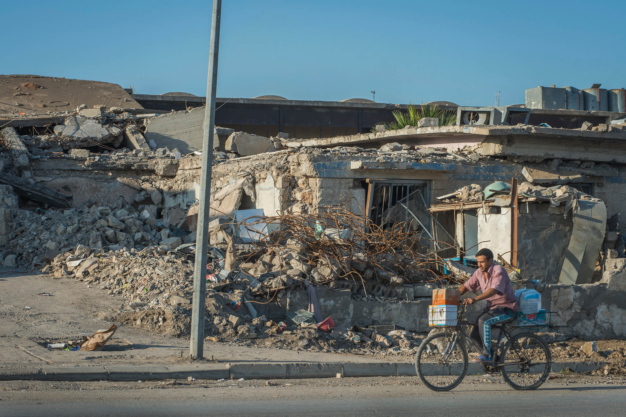 VanHelvert- Verwoeste huizen in de Iraakse stad Mosul in 2017. European Union-Peter Biro-Flickr