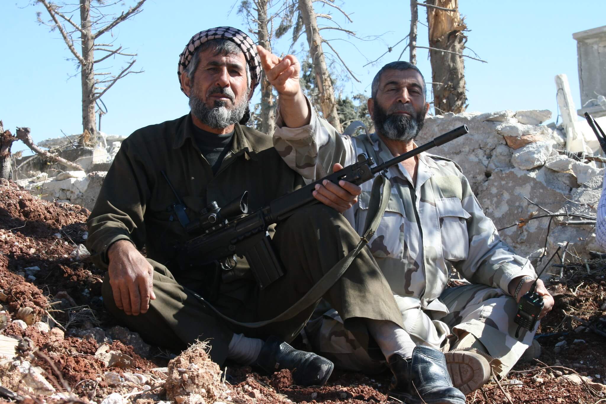 Armed rebels of the Sham Falcons Brigades in Syria, 2013. © David Axe-Flickr