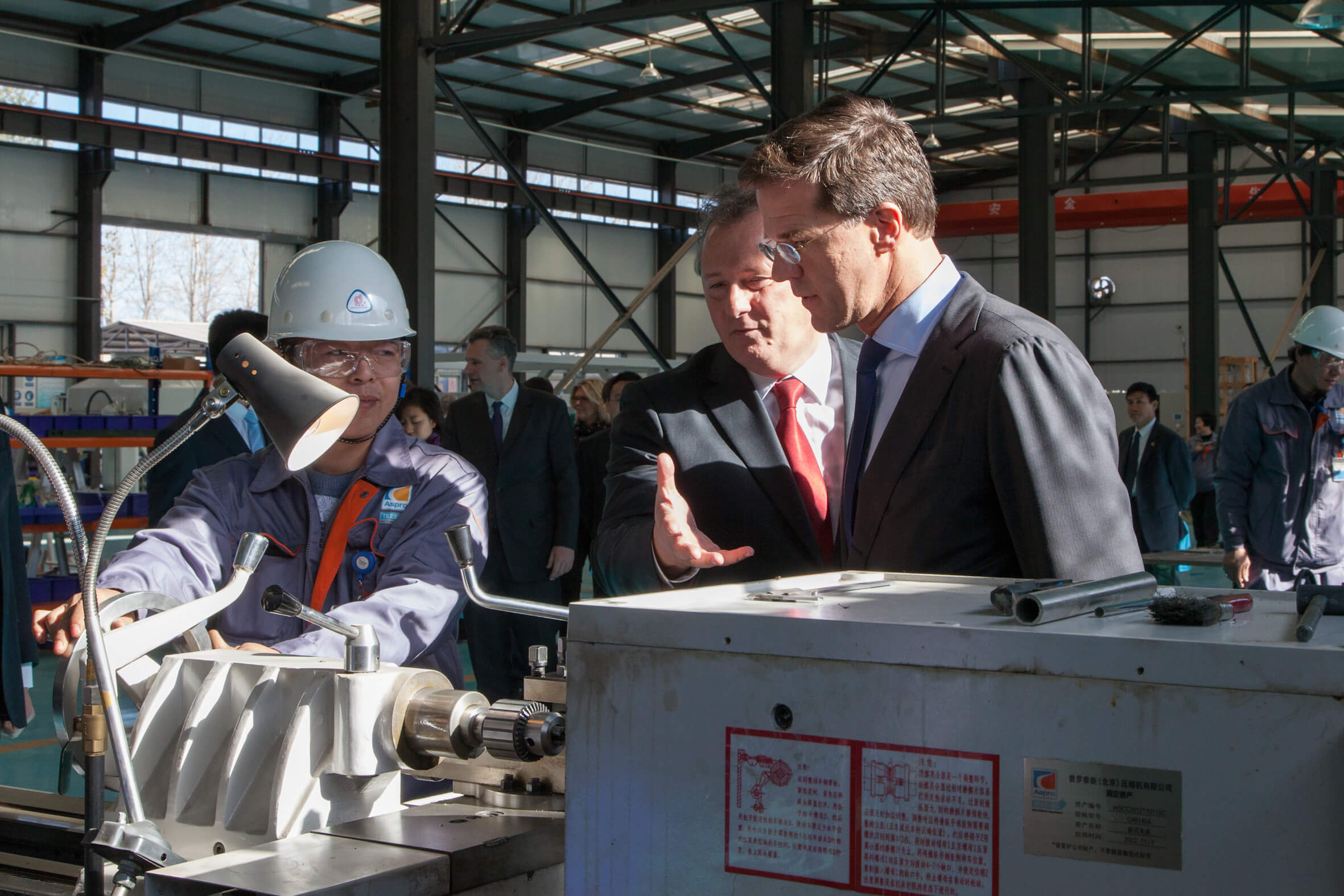 VanderLugt - Dutch prime minister Mark Rutte visiting Teesing Industrial Systems in Beijing in 2013. Minister-president Rutte - Flickr